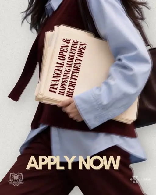 A student in a maroon sweater vest and blue shirt carries a stack of folders reading Financial Open & Happening Marketing Recruitment Open. Apply now.